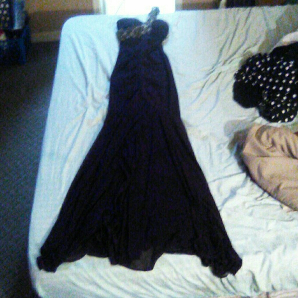 A dark purple xscape dress
